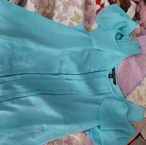 Very pretty thin tank plus off shoulder sleeve.